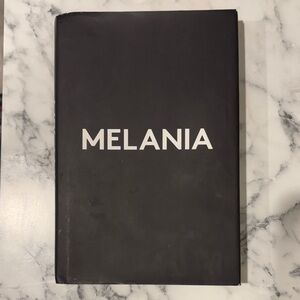 Melania Black Hardcover Book